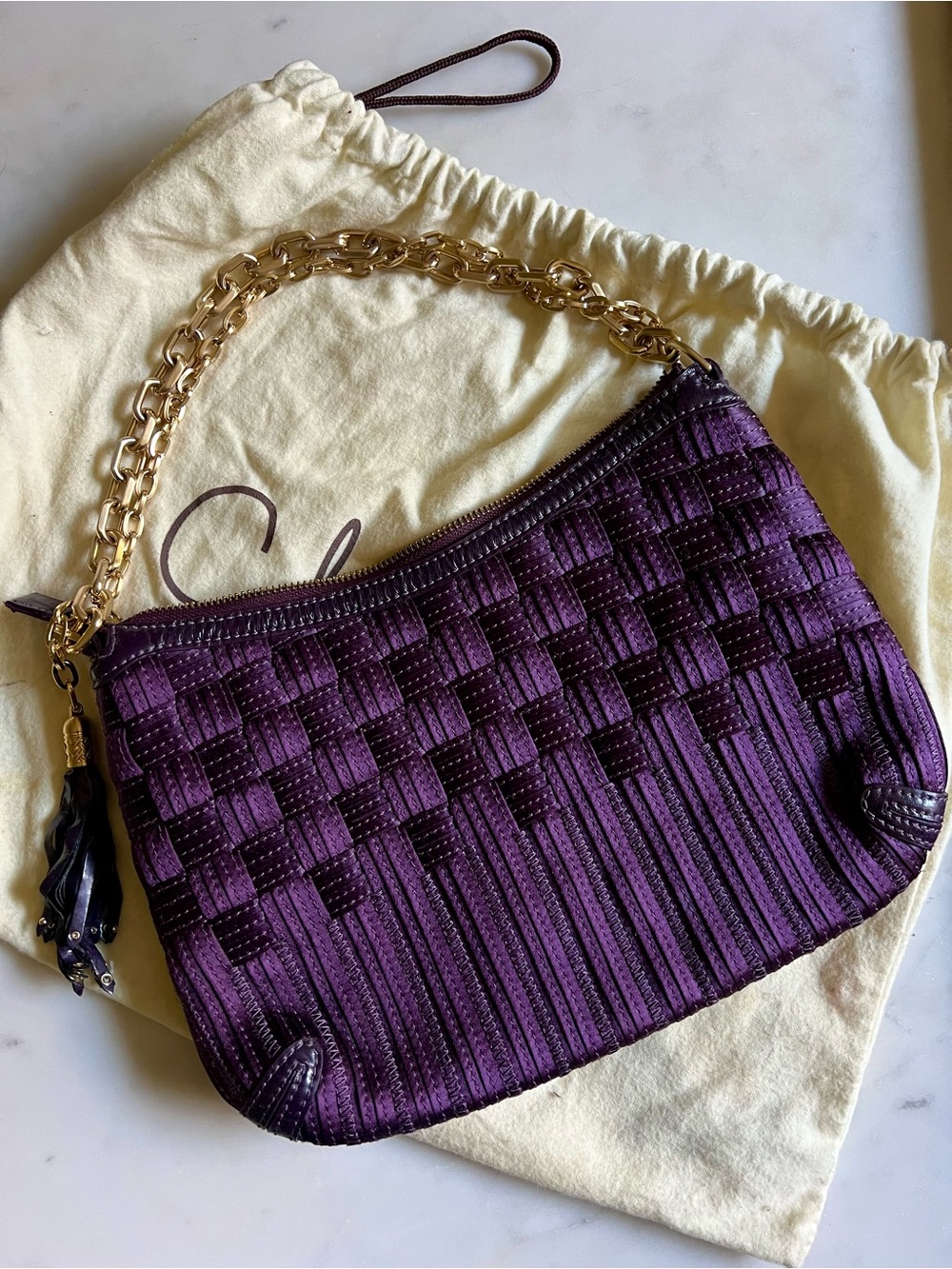 Cole Haan jewel-tone purple woven handbag